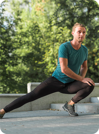 young-man-stretching-park.jpg